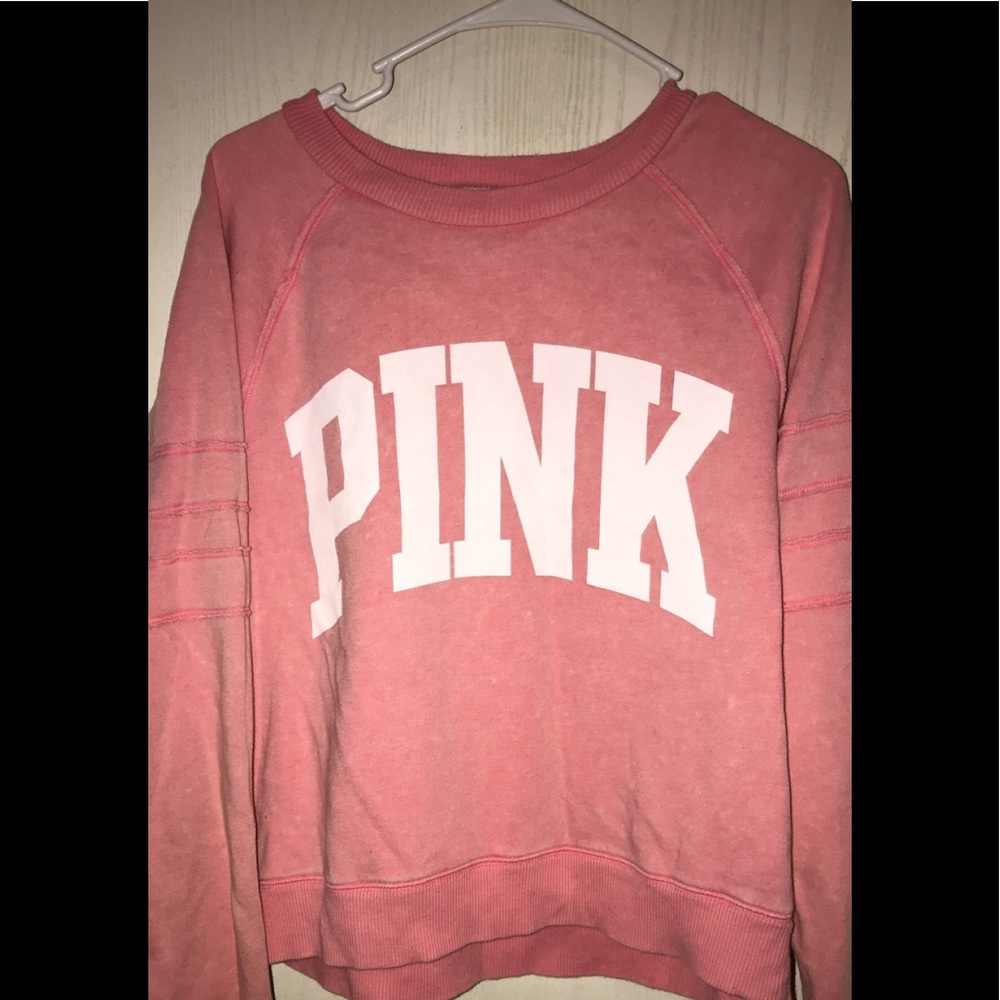 2 pink pullovers